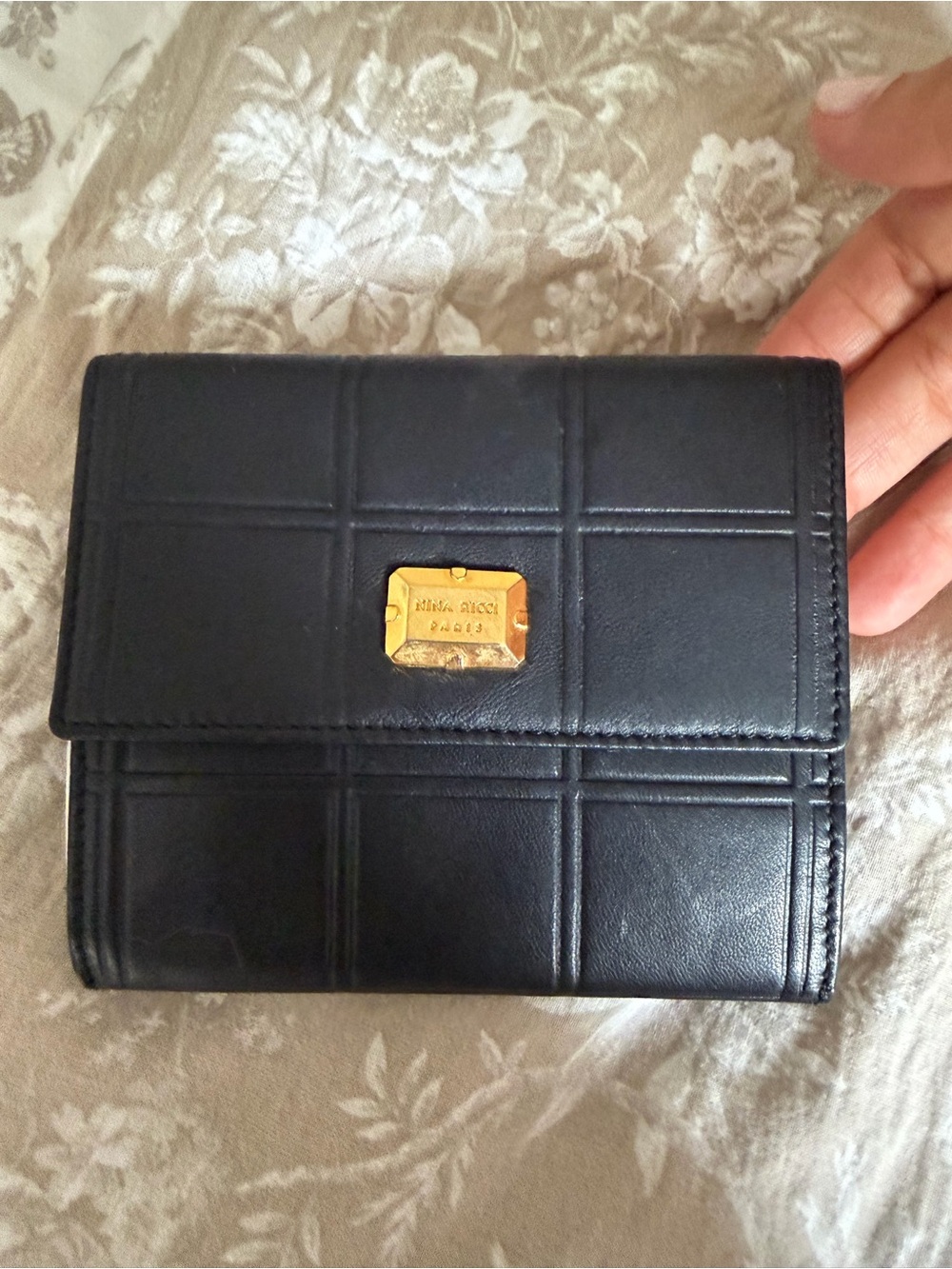 Nina Ricci Black Leather Quilted Wallet with Gold Plaque